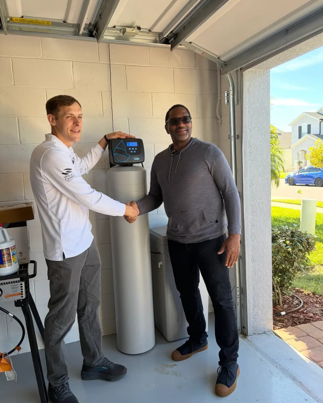 Happy client with Water Softener System installed by AquaClear Solutions FL in Apopka, FL