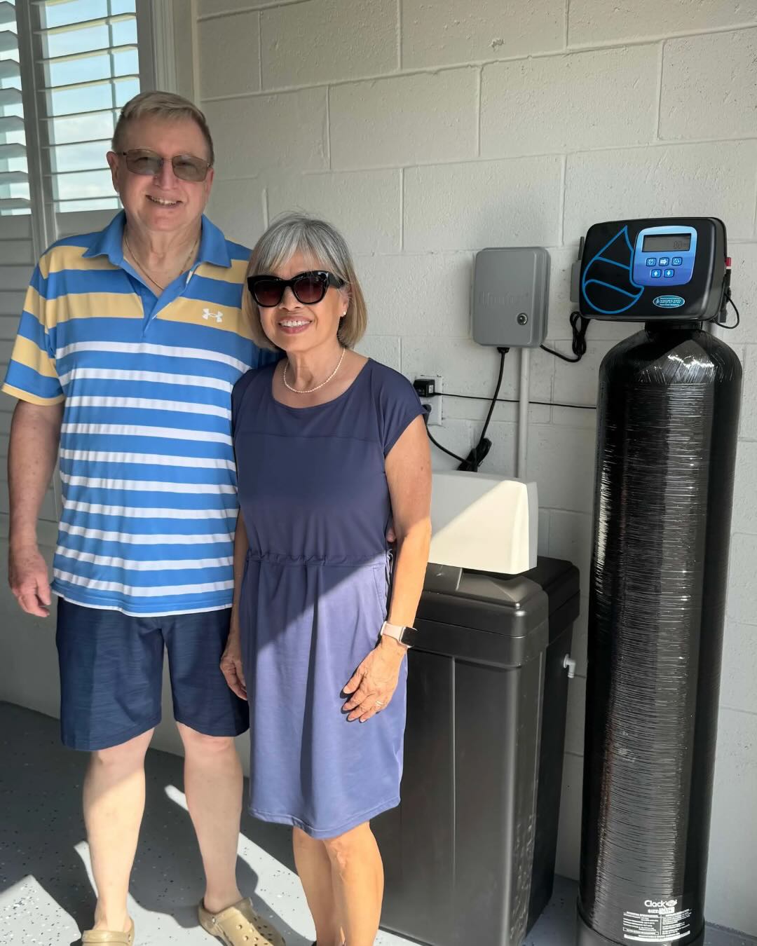 Happy client with Water Softener System installed by AquaClear Solutions FL in Apopka, FL