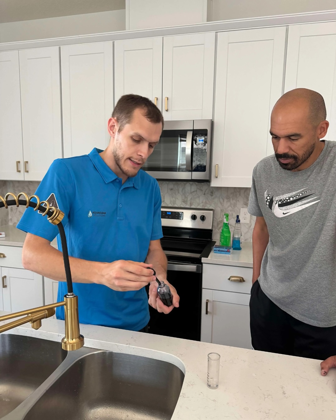 Happy client with Reverse Osmosis System installed by AquaClear Solutions FL in Apopka, FL